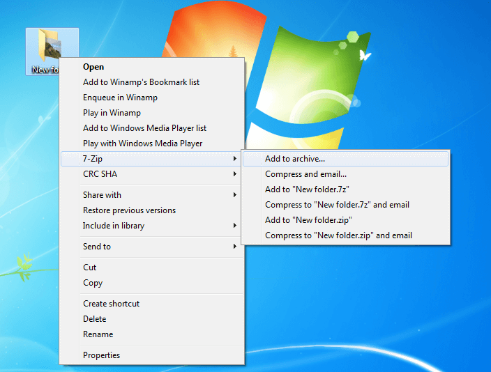 Windows desktop on which a folder is added to an archive via “7-Zip” in the context menu