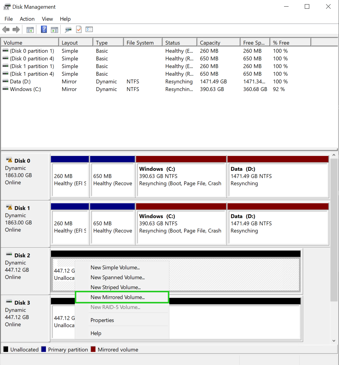 The Disk Management program with New Mirrored Volume highlighted.