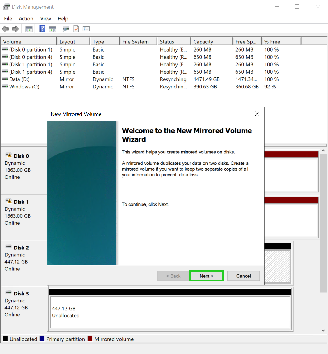The New Mirrored Volume wizard with the Next button highlighted.
