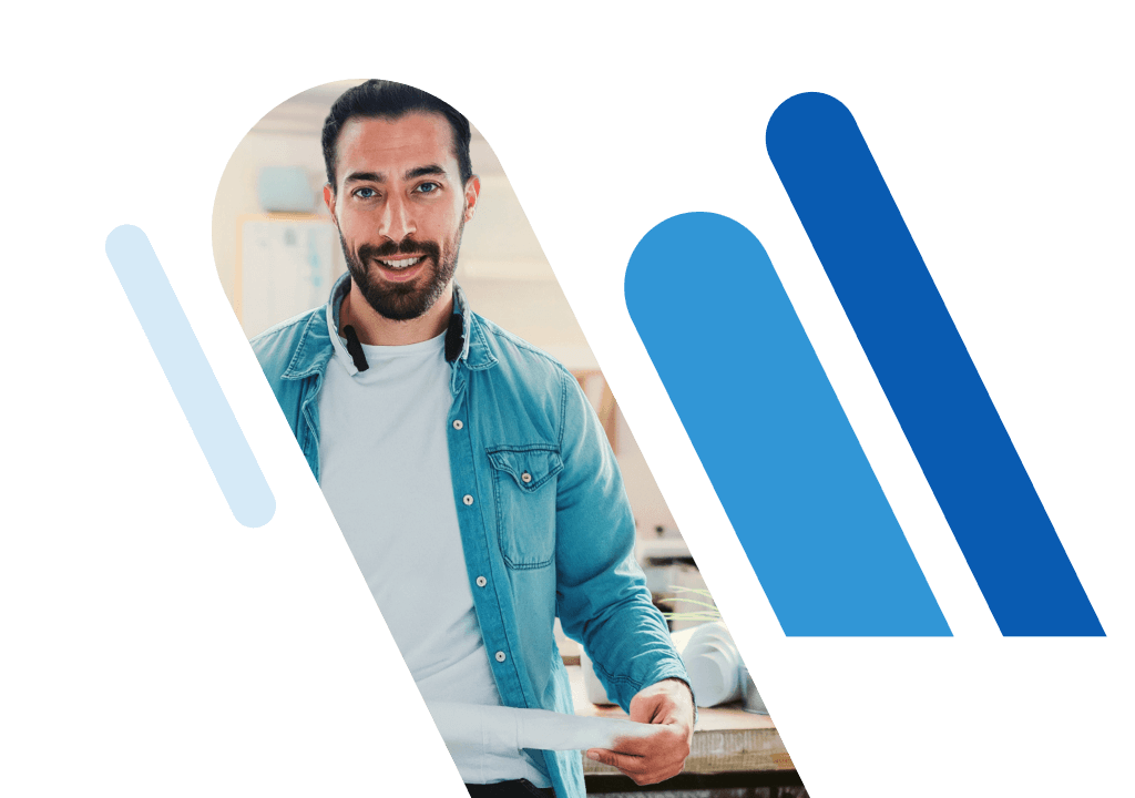 Smiling man in casual clothing framed by abstract blue graphic shapes.